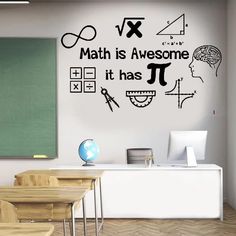 a classroom with black and white wall decals that say math is awesome it has pi