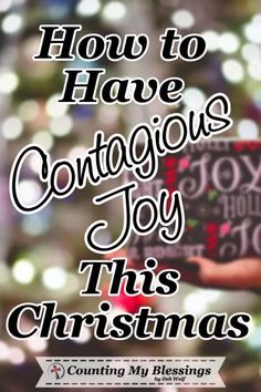 someone holding a christmas card with the words how to have conscious joy this christmas