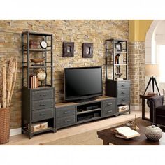 an entertainment center with bookshelves, shelves and a flat screen tv