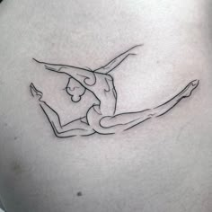 a tattoo on the back of a woman's stomach depicting a man doing gymnastics