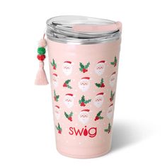 a pink christmas cup with santa and holly on it