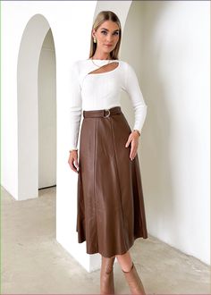 Take on the day in style this season in the fabulous new Nietta PU Midi Skirt! Add your fave basic top and ankle boots to finish off the look- Invisible Zip Closure- Includes Belt w/ Belt Loops- Stretch- Not Lined- Small sizing, consider purchasing size up if between sizes.- PU / Rayon LiningCare Instructions: Cold hand wash only. MODEL MEASUREMENTS Alana Wearing a Size 16 Height - 171cm Bust - 108.5cm Waist - 91cm Hip - 110cm LillyWearing Smallest Size AvailableHeight: 170cm / 5'7inBust: 81cm / Midi Skirt Outfits, Fashionable Skirts, Skirts And Boots, A Line Midi Skirt, Leather Skirt Outfit, Ombre Fabric, Date Night Looks