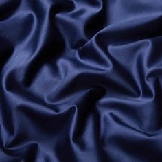 a close up shot of a blue fabric