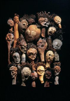 a group of masks sitting on top of each other