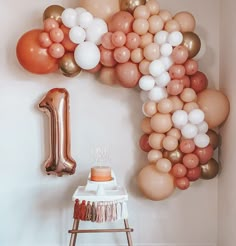 a balloon wall with an number one on it