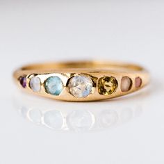 local eclectic | She's an Artist Ring in Yellow Gold Colorful Wedding Ring, Pink Moonstone, Local Eclectic, Wink Wink, Rainbow Sapphires, Moonstone Engagement, Sand Casting, Silver Wedding Bands, Peach Moonstone