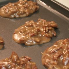 chocolate cookies with pecans and caramel drizzled on top are ready to go into the oven