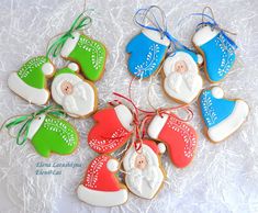 decorated christmas cookies with santa and stockings on them