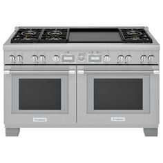 a silver stove top oven with two burners on each side and one door open