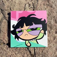 a painting of a cartoon character with sunglasses on it's face sitting on some rocks