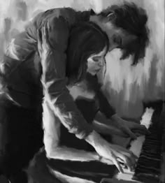 two people are playing the piano together