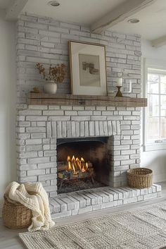 a living room with a fire place and rugs