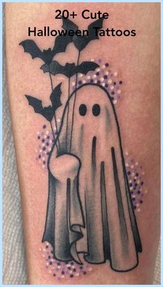 a black and white tattoo with a ghost holding a bat