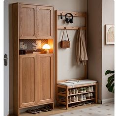 a wooden shoe rack sitting next to a wall with shoes on it and a lamp in the corner