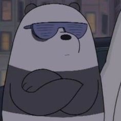 a cartoon bear with sunglasses on his face