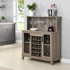 a wooden cabinet with wine glasses on it