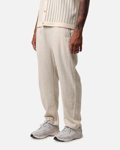 Immerse yourself in the laidback style of the Ezrah Linen Pants. Crafted from a breathable linen construction, these pants offer a comfortable and effortlessly stylish option for any occasion. The elasticated waist ensures a flexible fit, providing ease of movement, while the adjustable drawstring adds a personalised touch to your comfort. Cop yours today at Culture Kings. - Linen construction - Elasticated waist - Adjustable drawstring - Zip fly and button close - Dual side pockets - Regular fi Laidback Style, Laid Back Style, Culture Kings, Linen Pants, Linen Blend, Oatmeal, Fitness Models, Pants, How To Wear