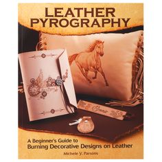 a book cover with an image of a horse on the pillow and keychain