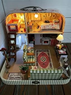 an overhead view of a doll house with furniture