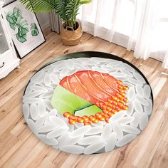 a round rug with a piece of food on it in the middle of a wooden floor