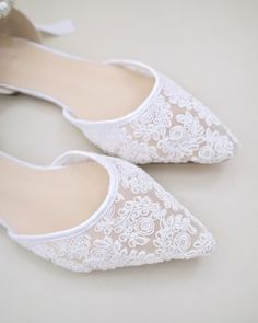 Crochet lace pointy toe flats for comfortable wear throughout your special day and perfect for wedding party. With pearl ankle strap to create a classic yet sophisticated look for any occasion. DETAILS: UPPER: Synthetic upper and lining MATERIALS: Manmade outsole HEEL HEIGHT: 0.3" ORIGIN: Imported Fitted Low Heel Flats For Party, Elegant Summer Pointed Toe Flats, Elegant Pointed Toe Flats With Flat Heel For Summer, Elegant Summer Pointed Toe Flats With Flat Heel, Elegant Summer Wedding Flats, Elegant Wedding Flats For Summer, Summer Wedding Flats With Round Toe, Elegant Flat Wedding Shoes For Spring, Elegant Party Flats