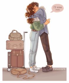 a man and woman hugging in front of luggage