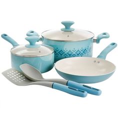 a set of blue pots and pans with utensils