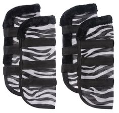 two pairs of black and white zebra print gloves