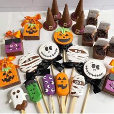 there are many halloween treats on the table