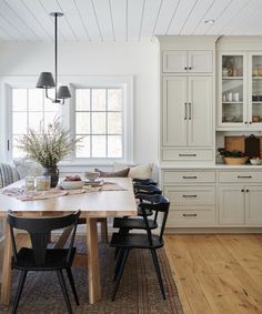 an instagramted photo of a kitchen and dining room