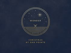 a blue and gold christmas card with the words wonder in a circle on top of it