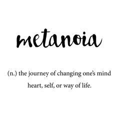 the words metanoia written in black ink