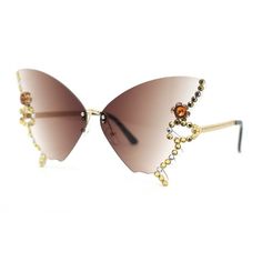 These sunglasses are a must-have for any fashionista. The luxuriously oversized rhinestone jewelry trim will elevate your look, while the exaggerated oversize real butterfly shaped silhouette will make you stand out from the crowd. The rimless construction makes them even more bold and rich, while the 100% UV400 polycarbonate gradient lenses will give you impeccable protection from the sun's harmful rays. (c034) Size: 5 3/8" (136mm) x 2 1/2" (62mm).  Color: Brown.  Gender: female.  Age Group: adult. Christian Brown, Real Butterfly, Rimless Sunglasses, Butterfly Shape, Gold Sunglasses, Rhinestone Jewelry, Brown Gold, Cloth Bags, Sunglasses Accessories