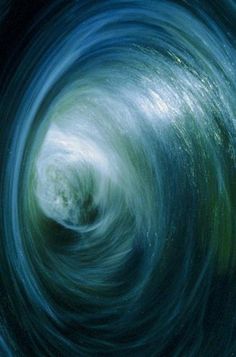 an image of a vortex that looks like it is going through the air with water