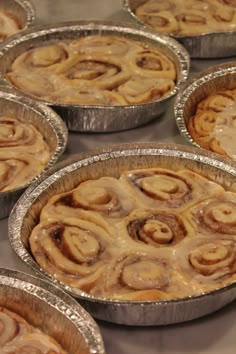 some pies that are sitting in tin foil