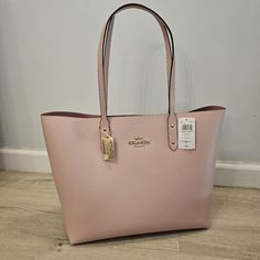 Brand New With Tags !!!! Coach Town Tote Handbag Shopper Bag 72673 Blossom Large Details Crossgrain Leather Inside Zip, Cell Phone And Multifunction Pockets, Fabric Lining Handles With 10 1/2" Drop 14" (L) X 12 1/2" (H) X 6 3/4" (W) No Dust Bag Elegant Large Bag For Errands, Large Bags For Errands, Large Pink Shopping Bag, Elegant Pink Tote Bag, Elegant Large Shoulder Bag For Shopping, Large Pink Shoulder Bag For Shopping, Classic Pink Shopping Bag, Elegant Large Shoulder Bag With Top Carry Handle, Elegant Large Shoulder Bag With Detachable Handle