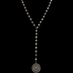 The Sacred Heart Lariat Necklace is made of faceted labradorite joined by gunmetal wire and a gunmetal clasp that allows it to be placed on any bead and worn several different ways. Known as the Sante Vierge medallion, it features the Sacred Heart on one side and the Madonna on the reverse. This medal is recast from the vintage original in Sterling Silver. It is French in origin. The Sterling Silver mark .925 is found on the edge of the medal, just below Her feet. Made in the USA in our sweet st Adjustable Silver Hand Knotted Necklace, Silver Hand Knotted Adjustable Necklace, Bohemian Silver Hand Knotted Jewelry, Silver Bohemian Jewelry, The Memorare, The Madonna, Immaculate Heart, The Sacred Heart, St Michael