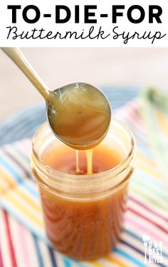 a spoon full of peanut butter and syrup on top of a jar with the words, how to use peanut butter to die - for buttermilk syrup