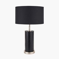 a table lamp with a black shade on it