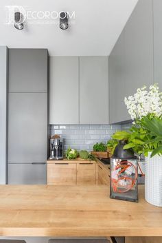 the kitchen is clean and ready to be used as a dining room or office space