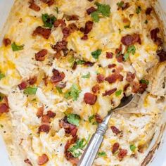 a casserole dish filled with cheese and bacon