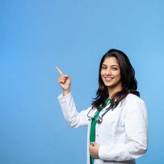 a woman in white shirt and green tie pointing to the side with her finger up