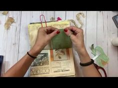 a woman is working on crafts with scissors and other items in front of the camera