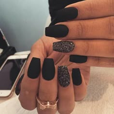 MATTE BLACK NAILS FOR 2017 They’re simple, elegant, and classic. You can’t go far wrong with matte black nails, and when you throw that shimmer-glitter one in for good measure, you have the perfect matte nail designs for fall and winter. We’re certainly adding them to our wish-list for this season! Matte Black Nails, Colorful Nails, Matte Nails Design, Super Nails, Black Nail, Prom Nails, Accent Nails, Nail Polishes, Matte Nails