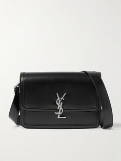 SAINT LAURENT' 'Solferino' bag upholds the house founder's legacy of elegance and craftsmanship. It's cut from smooth black leather and embellished with the iconic YSL logo plaque on the front. Ysl Men, Saint Laurent Collection, Messenger Bag For Men, Media Logo, Messenger Bag Men, Leather Messenger Bag, Saint Laurent Bag, Leather Messenger, Laid Back Style