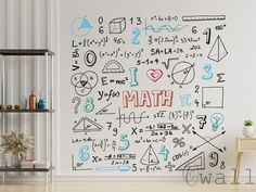 a white wall with many different types of math written on it in red and blue