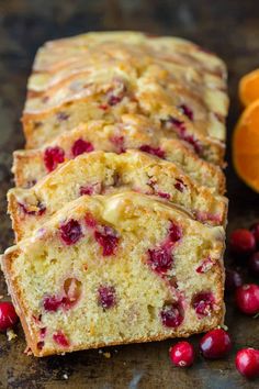 two loaves of cake sitting on top of a cooling rack