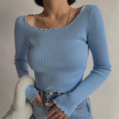 Winter Light Blue Ribbed Top, Solid Light Blue Top For Spring, Light Blue Solid Color Top For Spring, Blue Long Sleeve Ribbed Top, Chic Blue Ribbed Top, Winter Blue Ribbed Tops, Winter Ribbed Blue Tops, Trendy Solid Color Blue Tops, Trendy Blue Solid Color Tops