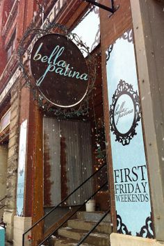 a sign on the side of a building that says belfiorina first friday weekend