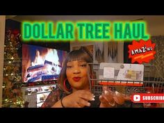 a woman holding a shopping cart in front of a christmas tree with the words dollar tree haul